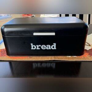 Black metal bread box
